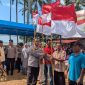 Sambut HUT RI ke-81, Polresta Barelang Bagikan Ratusan Bendera dan 100 Paket Bansos di Sembulang Galang